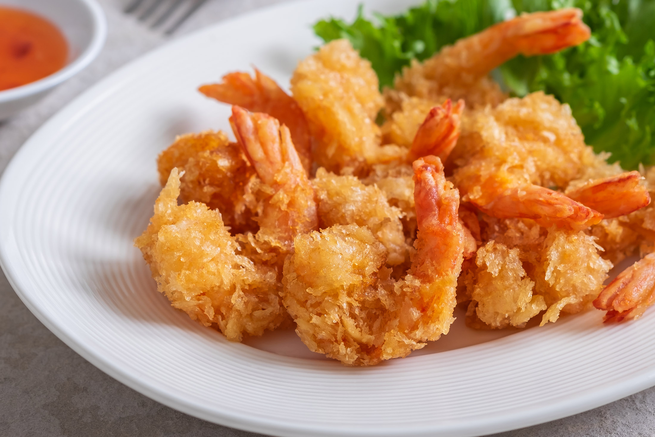 Fried shrimp and vegetable on plate Photographer: Amarita/iStockphoto