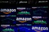 A monitor displays Amazon.com Inc. stock information at the Nasdaq MarketSite in New York, U.S., on Tuesday, Sep. 4, 2018. Amazon.com Inc. briefly became America's second trillion-dollar company on Tuesday after adding $434 billion to its market cap this year.