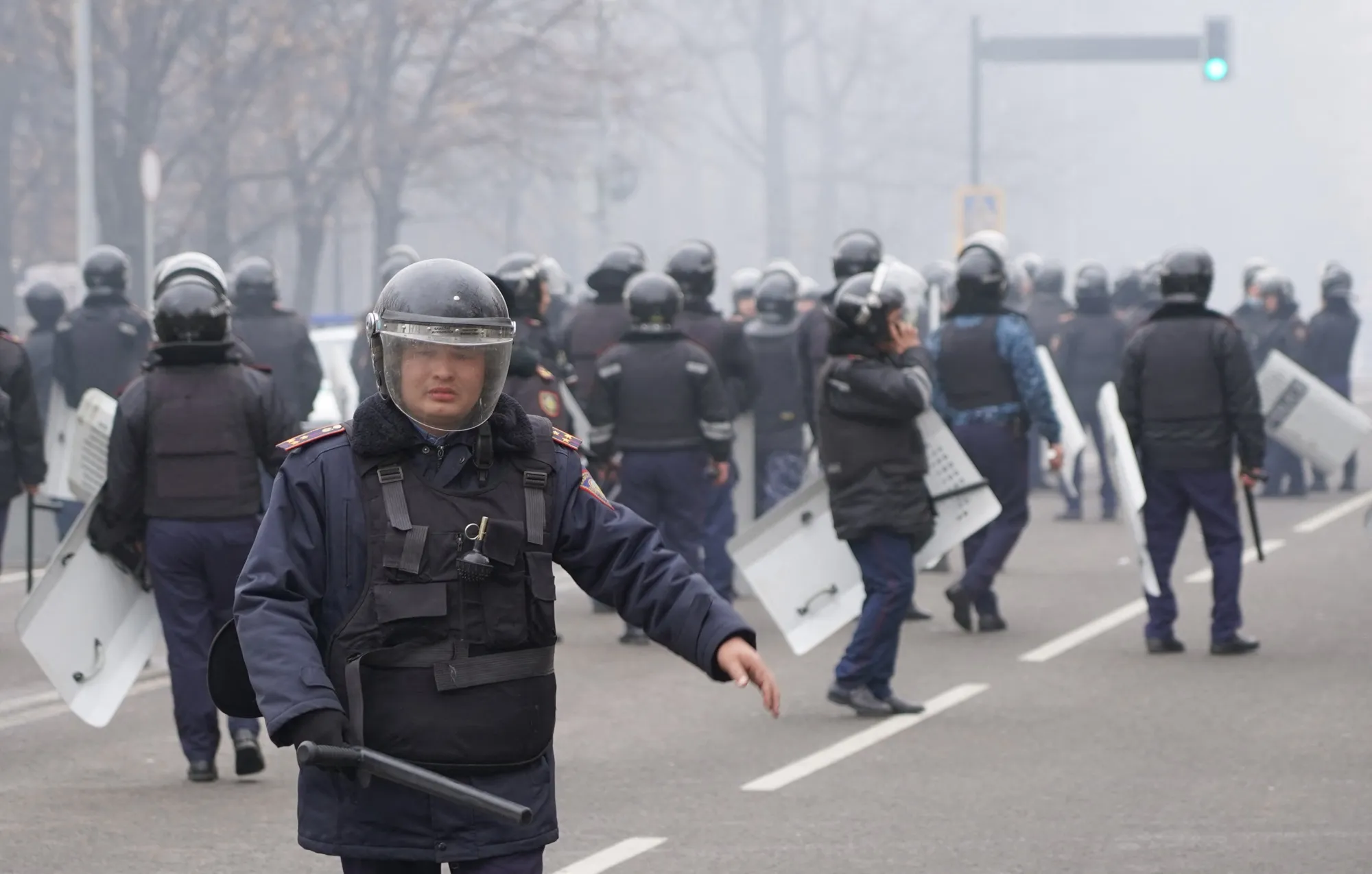 Riot police on the streets of Almaty.