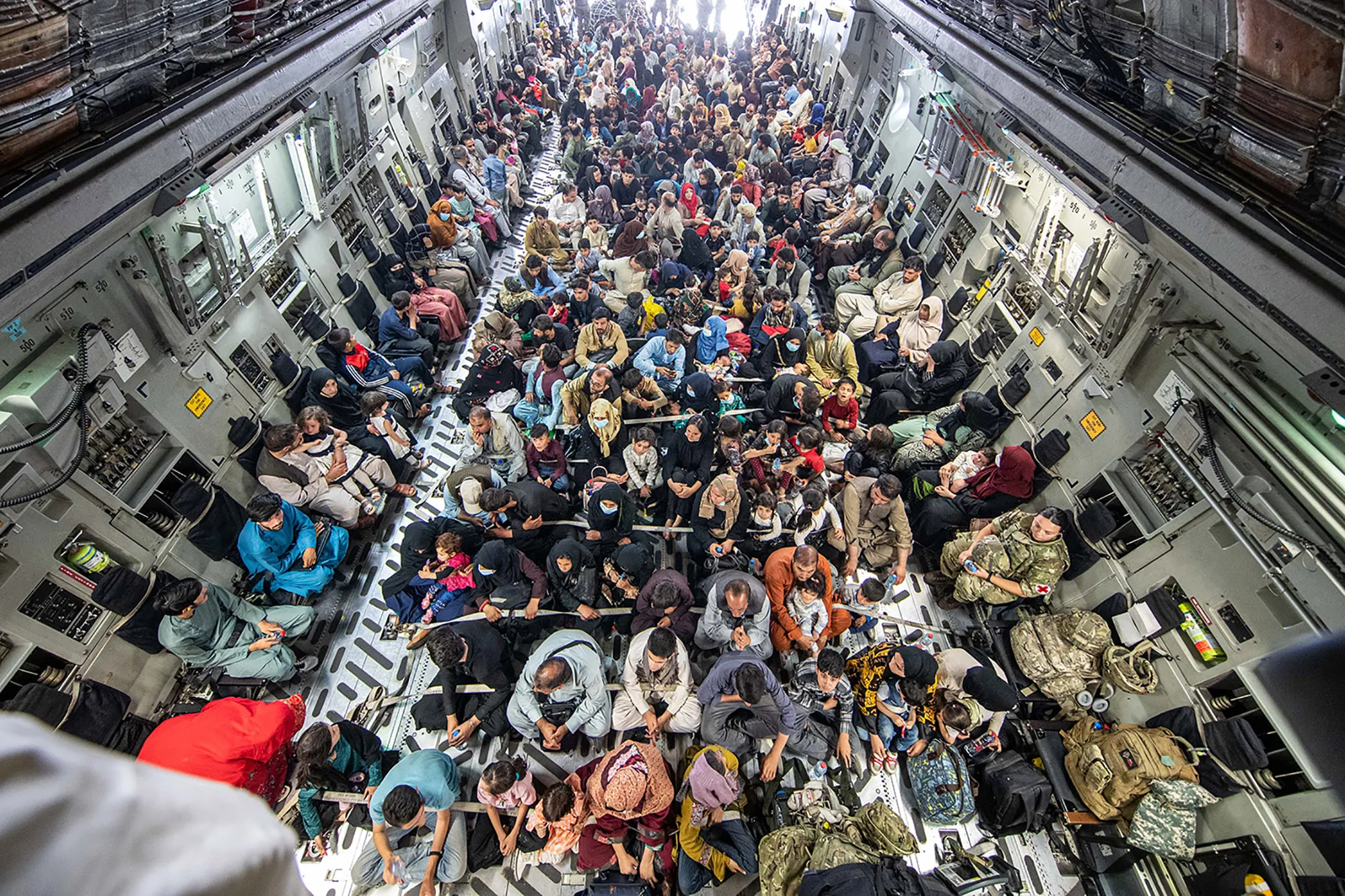 KABUL, AFGHANISTAN - AUGUST 21: In this handout image provided by the Ministry of Defence, a full flight of 265 people are evacuated out of Kabul by the UK Armed Forces on August 21, 2021 in Kabul, Afghanistan. The British armed forces are evacuating UK citizens and eligible personnel out of the Afghan capital after the Taliban took control of the country last week.