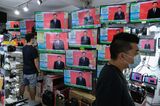 Public Screens as China's Leader Xi Jinping Delivers Speech in Shenzhen