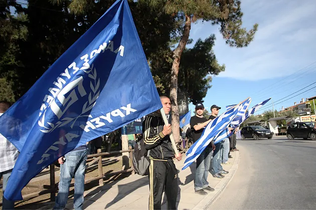 Members of the Golden Dawn political organization take part in a demonstration in Peraia, a suburb east of Thessaloniki, on April 26