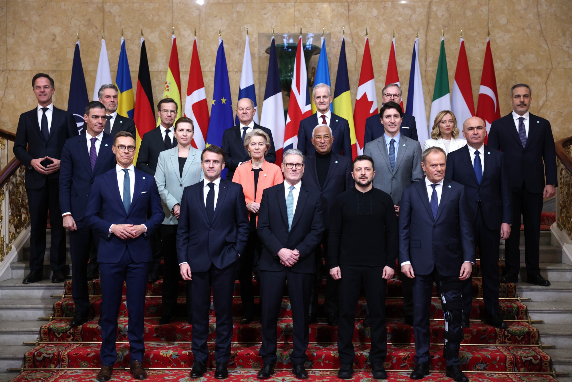 Keir Starmer,&nbsp;Volodymyr Zelenskiy and other world leaders at a family photo during a summit at Lancaster House in London&nbsp;on Sunday.