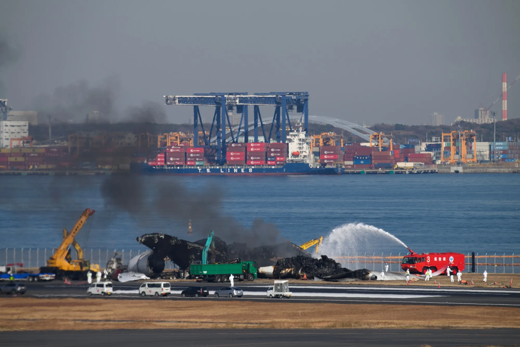 The wreckage of a Japan Airlines passenger jet that collided Jan. 2 with a Japan Coast Guard plane at Haneda Airport in Tokyo on Jan. 5.