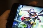 An avatar is displayed in an arranged photograph of the Honour of Kings mobile game, developed by Tencent Holdings Ltd.