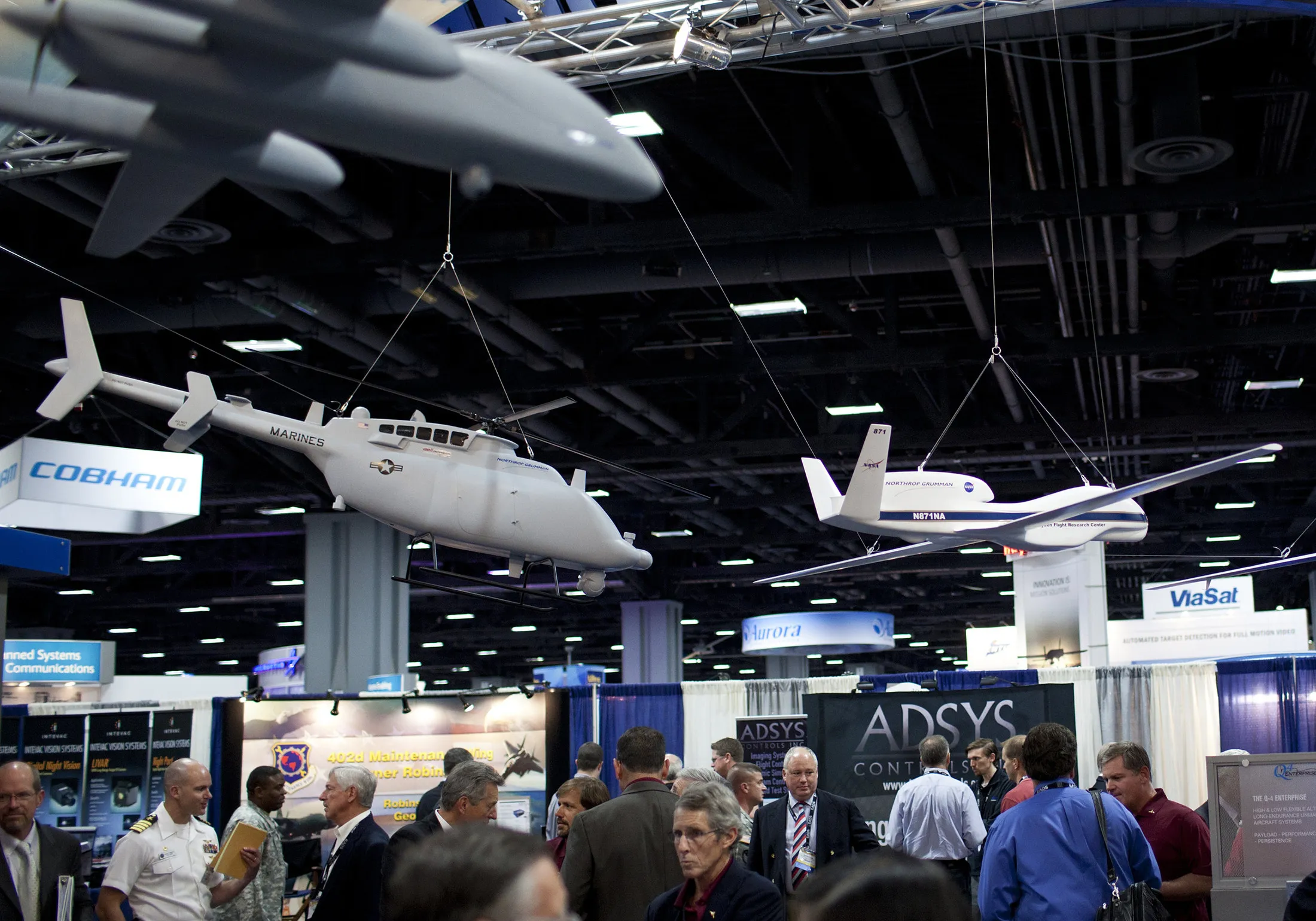 Models of Northrop Grumman's unmanned aerial vehicles are seen above their display area during a conference in Washington, D.C.
