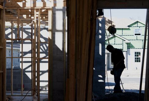 A Worker At A Home Under Construction