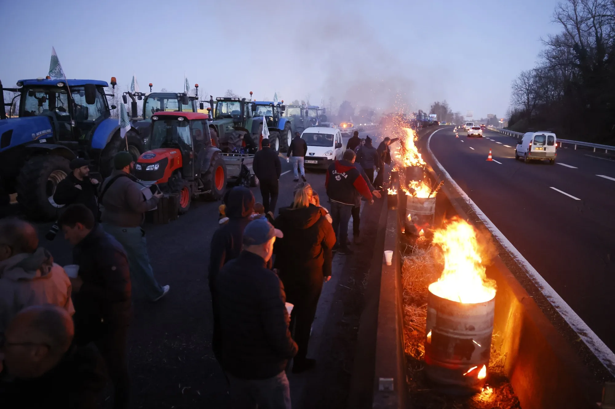 Farmers block a highway near Ableiges, north of Paris,&nbsp;Jan. 26.