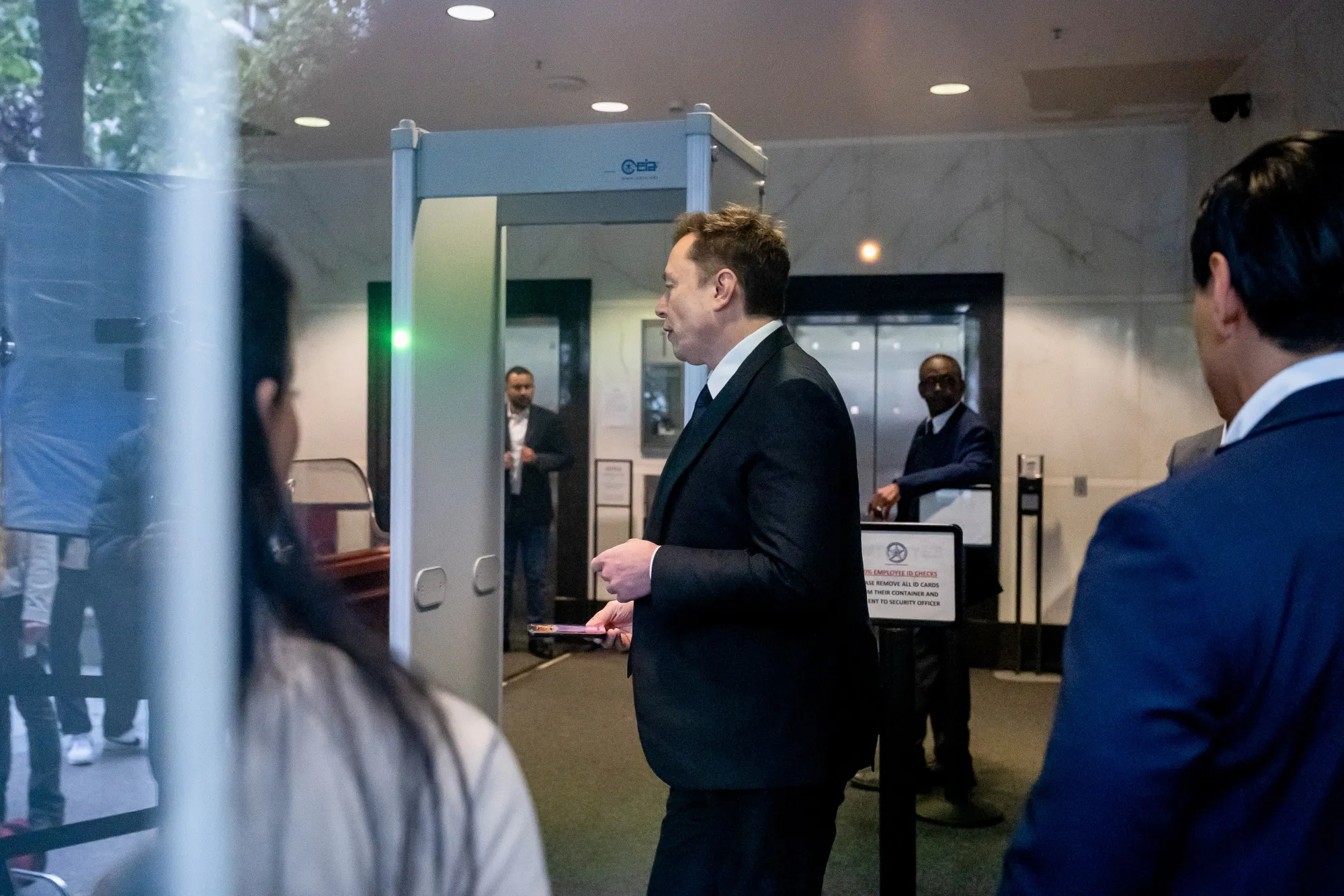Elon Musk arrives at the federal court in Oakland, California, on April 30.