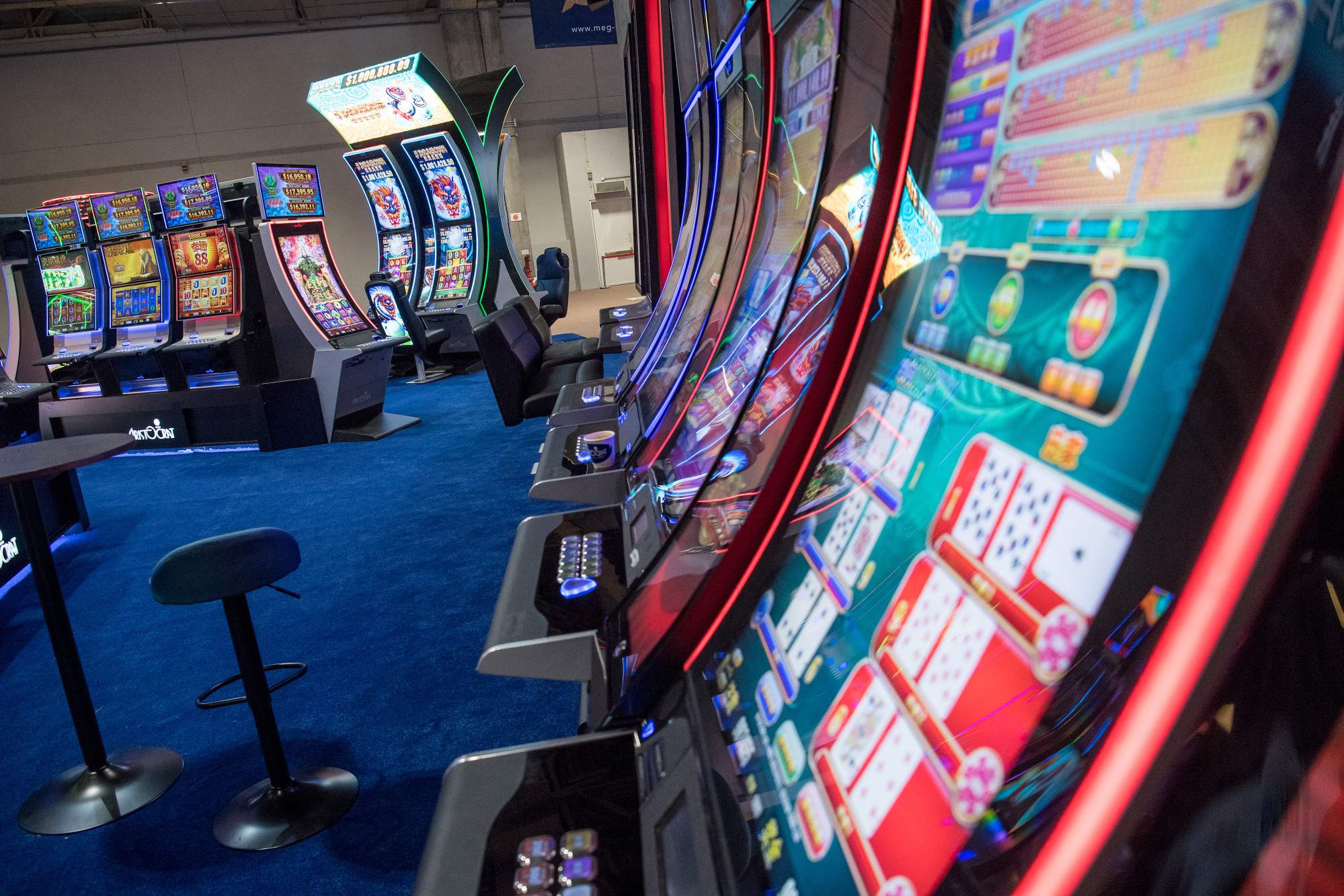 Electronic gaming machines manufactured by Aristocrat Leisure Ltd. stand on display during the Macau Gaming Show (MGS) in Macau, China, on Tuesday, Nov. 14, 2017. Macau regulators are strengthening their oversight of the almost $30 billion casino industry as they plan to release details next year of the renewal process for operators.