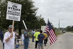 Workers from a Kellogg’s cereal plant picket along the main rail lines leading into the facility in Omaha, Nebraska, in Oct.