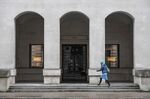 A pedestrian approaches 100 Pall Mall, housing the offices of KKR in London on March 10.