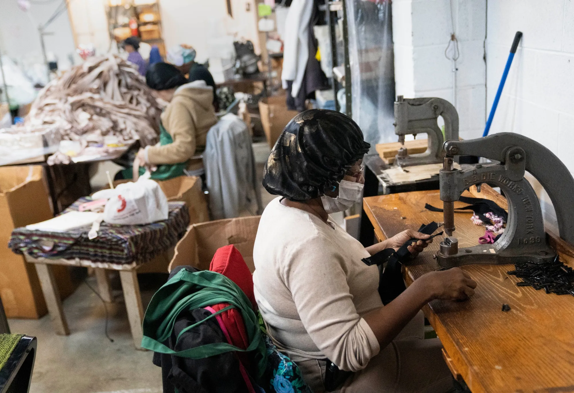 The US economy added 275,000 jobs last month, defying concerns that higher interest rates would cool the economy. Above: an I.M. Manufacturing Corp. facility in Virginia.