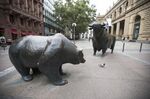 Bear and bull statues stand outside the Frankfurt Stock Exchange.