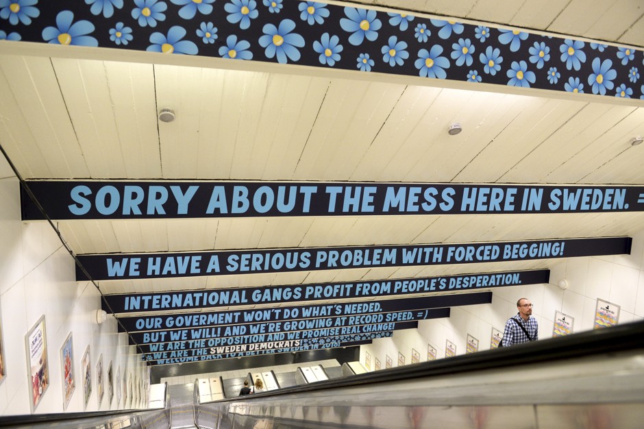 Signs put up by the Sweden Democrats political party are seen at Ostermalmstorg subway station in Stockholm, Sweden.