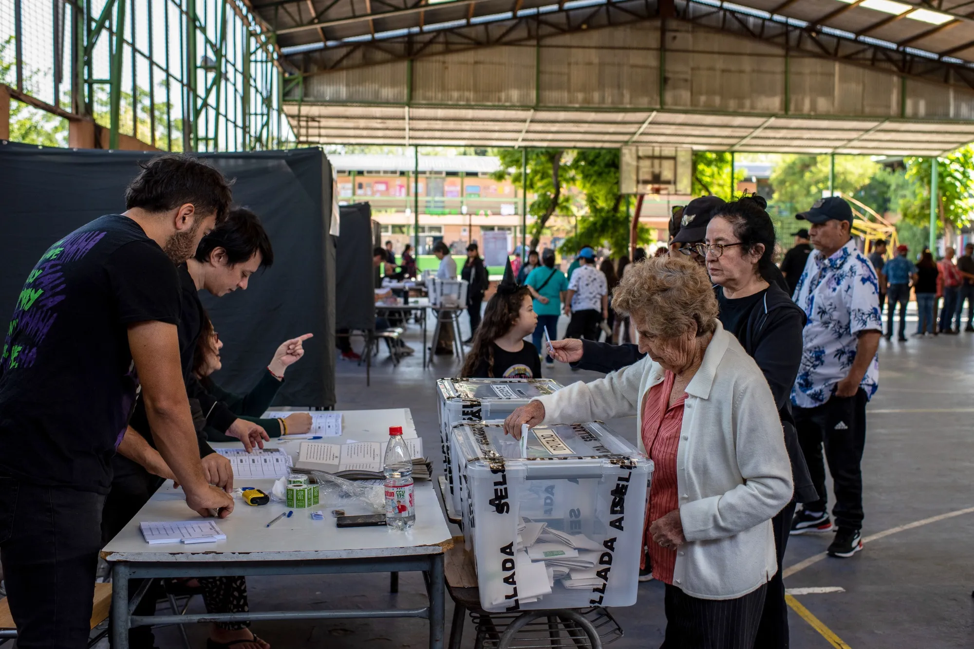 A voter cast a ballot at a polling station during the presidential election in Santiago on Nov. 16.