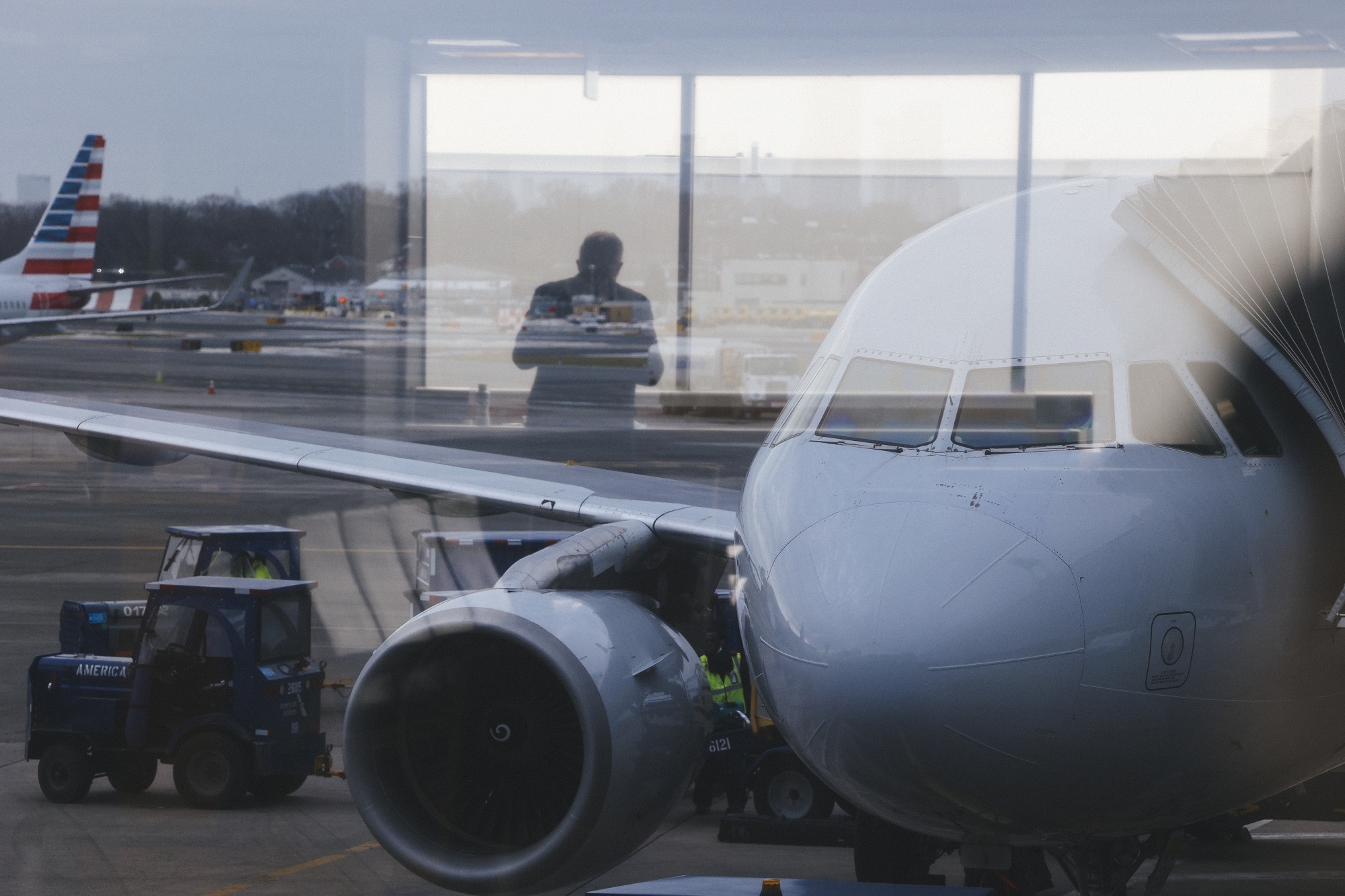 Travelers At LaGuardia and JFK Airports As NYC Enforces Travel Quarantine