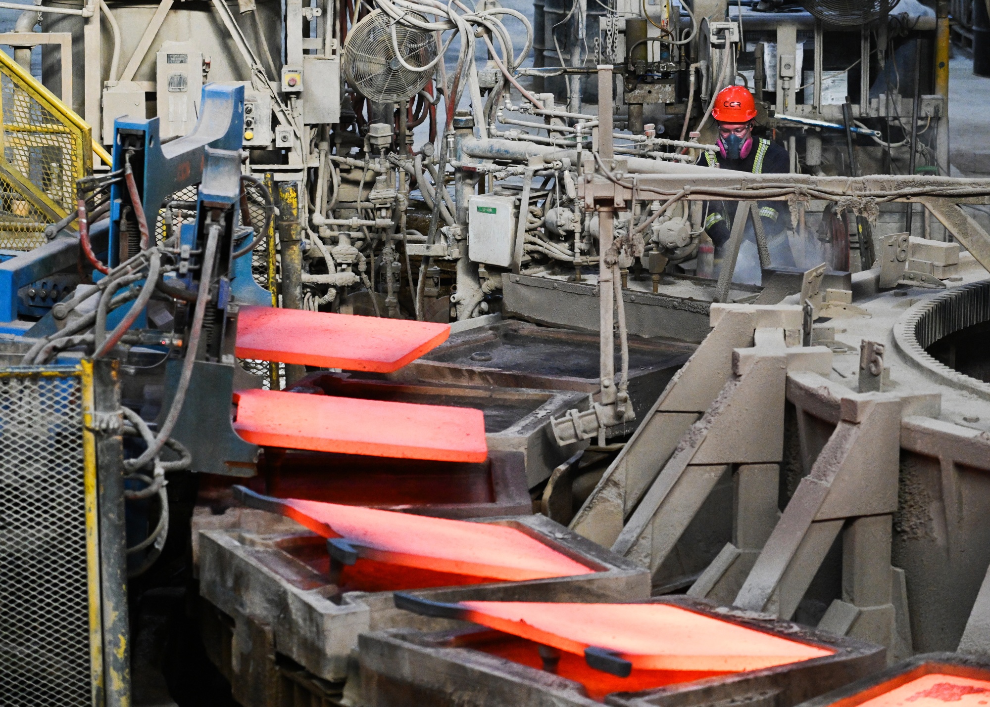 Copper anodes come out of a furnace at the Glencore Canadian Copper Refinery (CCR) in Montreal, Quebec, Canada on Tuesday, Aug. 12, 2025. The refinery has a production capacity of 325,000 metric tonnes of copper per year, sold in the form of cathodes.