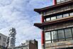 56 Leonard Street, known as the Jenga Building, Designed by Herzog & de Meuron seen from Canal street in Chinatown, Manhattan