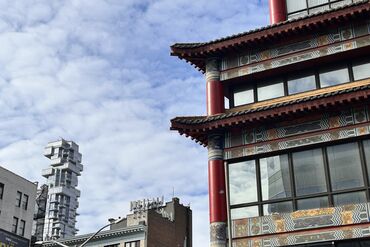 56 Leonard Street, known as the Jenga Building, Designed by Herzog & de Meuron seen from Canal street in Chinatown, Manhattan