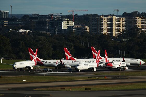 Qantas to Raise $1.3 Billion and Cut 6,000 Jobs to Survive Virus
