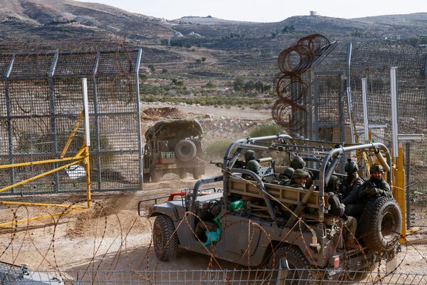 Israeli forces deployed in the buffer zone on the border with Syria on Dec. 10.