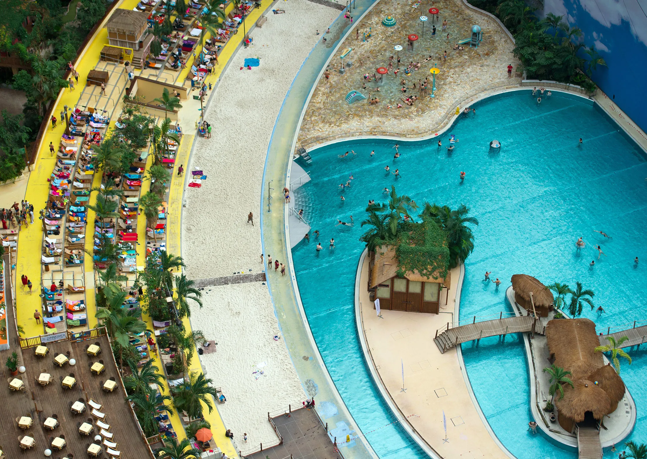 A pool and artificial beach at the Tropical Islands Resort in Brand.