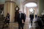 Mitch McConnell walks through the U.S. Capitol building in Washington, D.C., on Jan. 25.