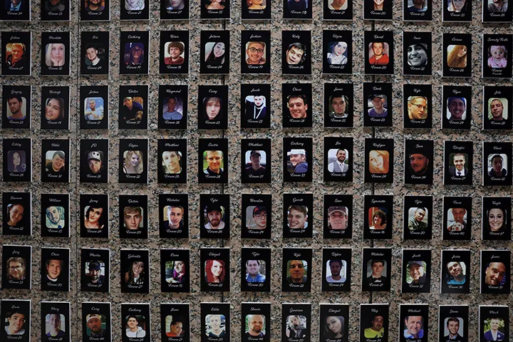Photos of fentanyl victims on display at The Faces of Fentanyl Memorial at the U.S. Drug Enforcement Administration headquarters&nbsp;in Arlington, Virginia.
