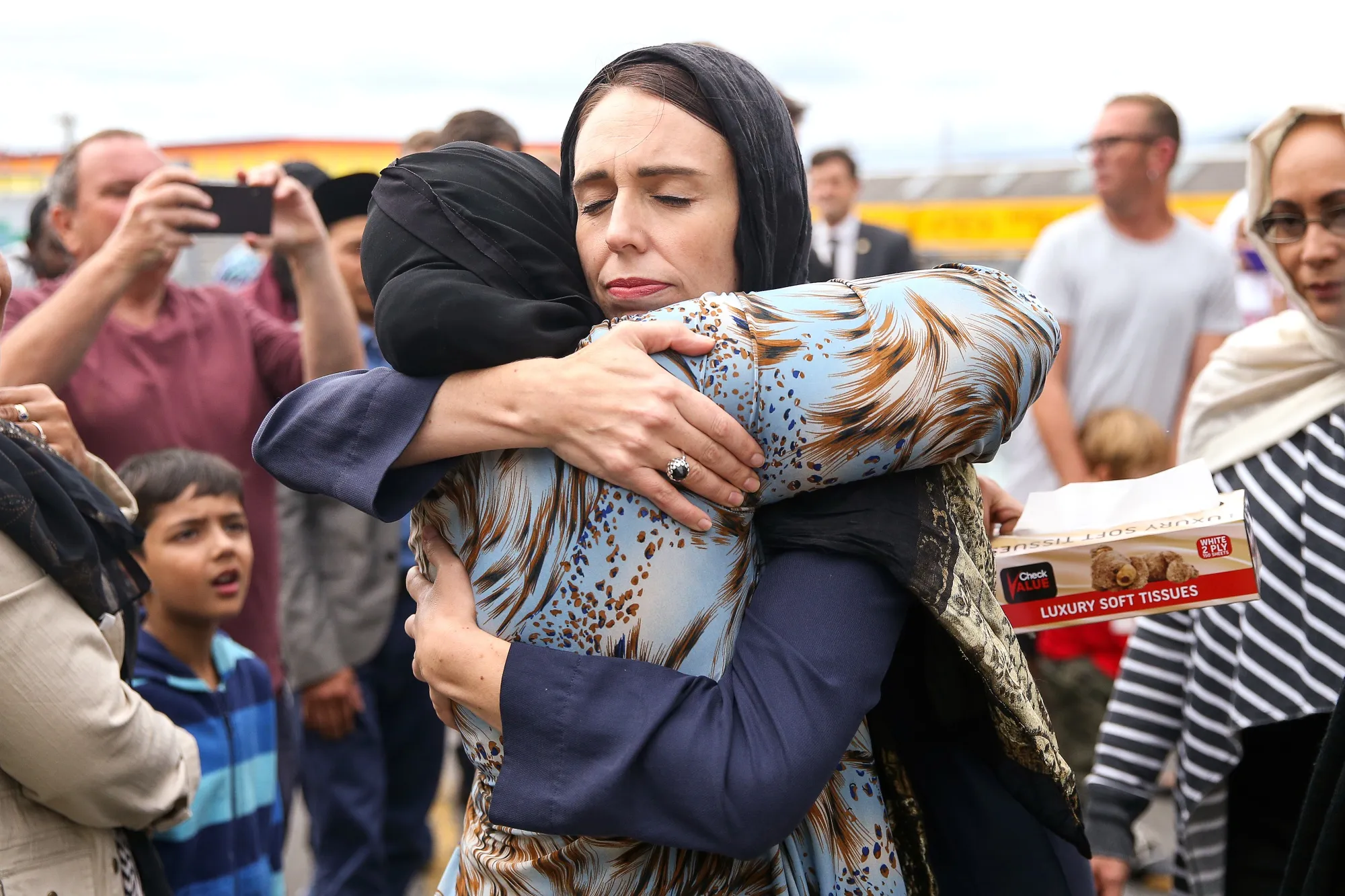 Jacinda Ardern hugs a mosque-goer at the Kilbirnie Mosque on March 17.