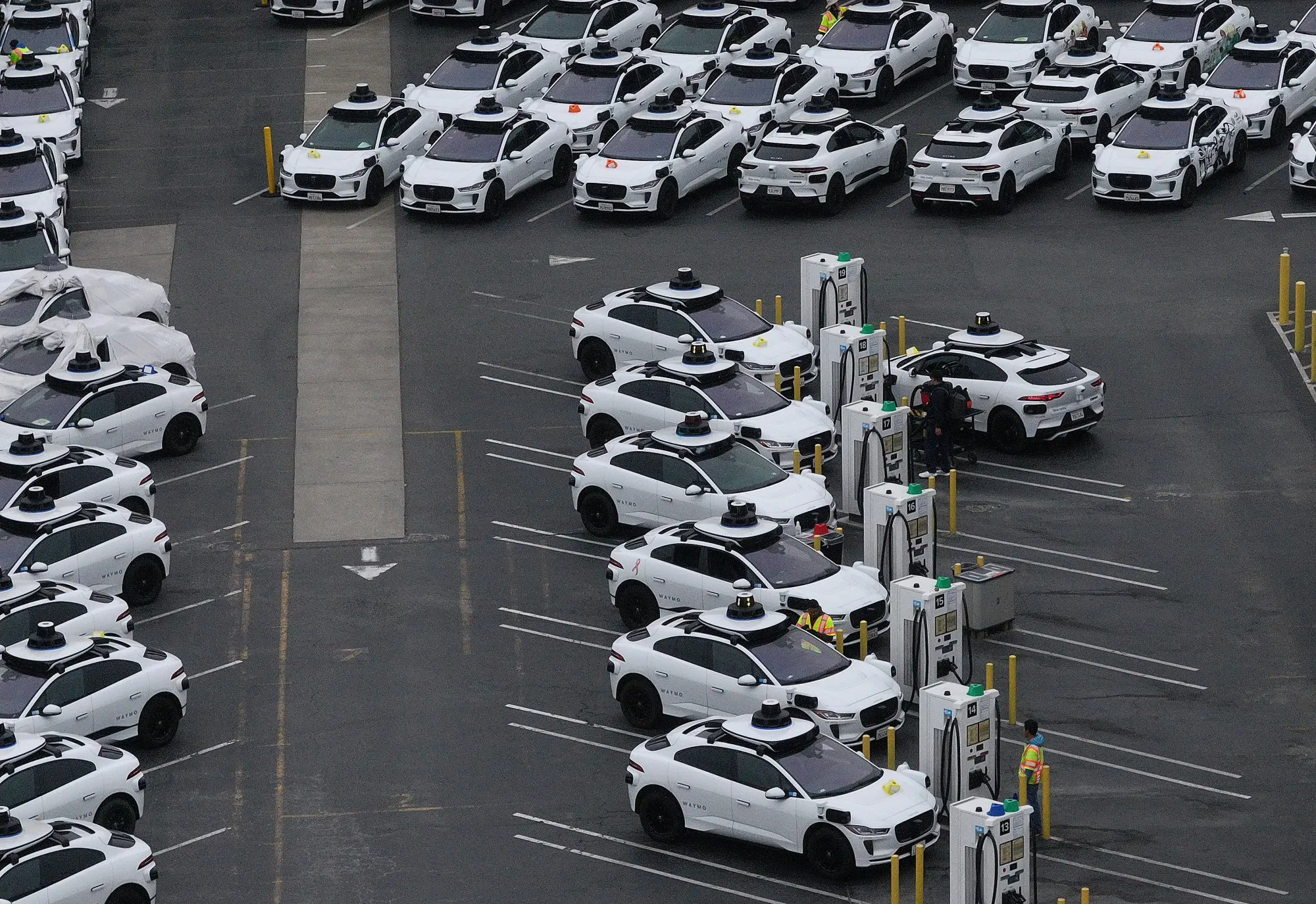 Waymo cars at a Waymo facility&nbsp;in San Francisco.