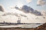 Gantry cranes sit on the dockside at the container terminal at the Port of Kribi, Cameroon.