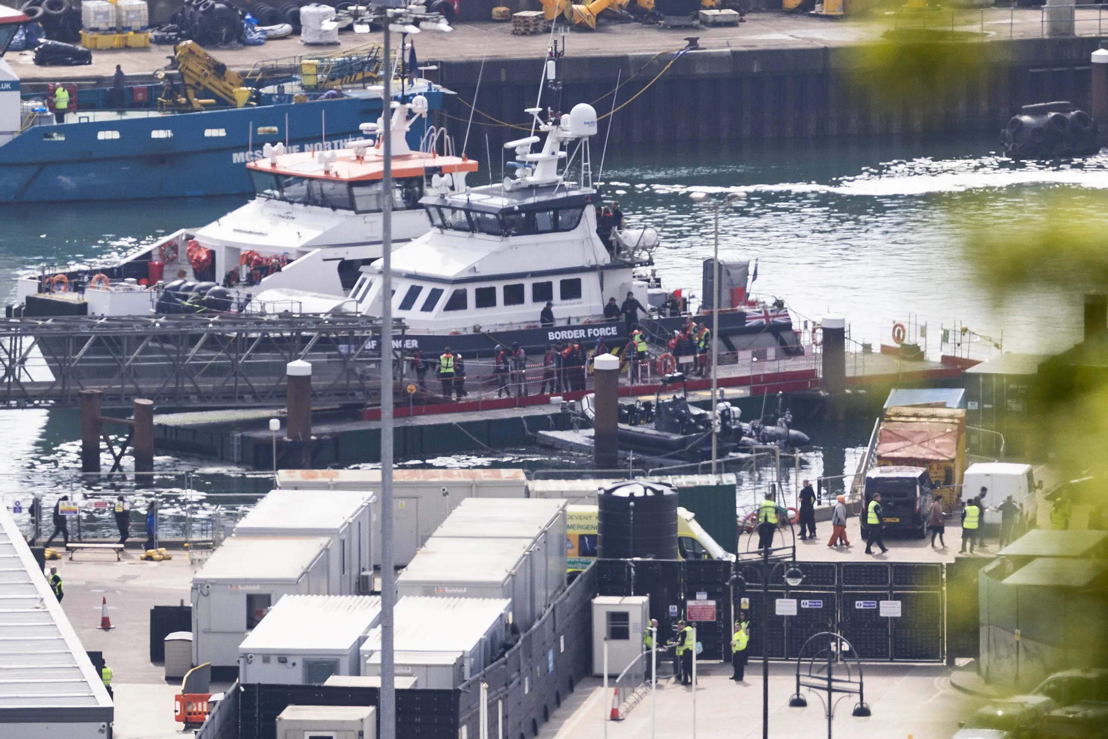Migrants are brought into Dover Harbour by Border Force in Dover, England, on May 17.