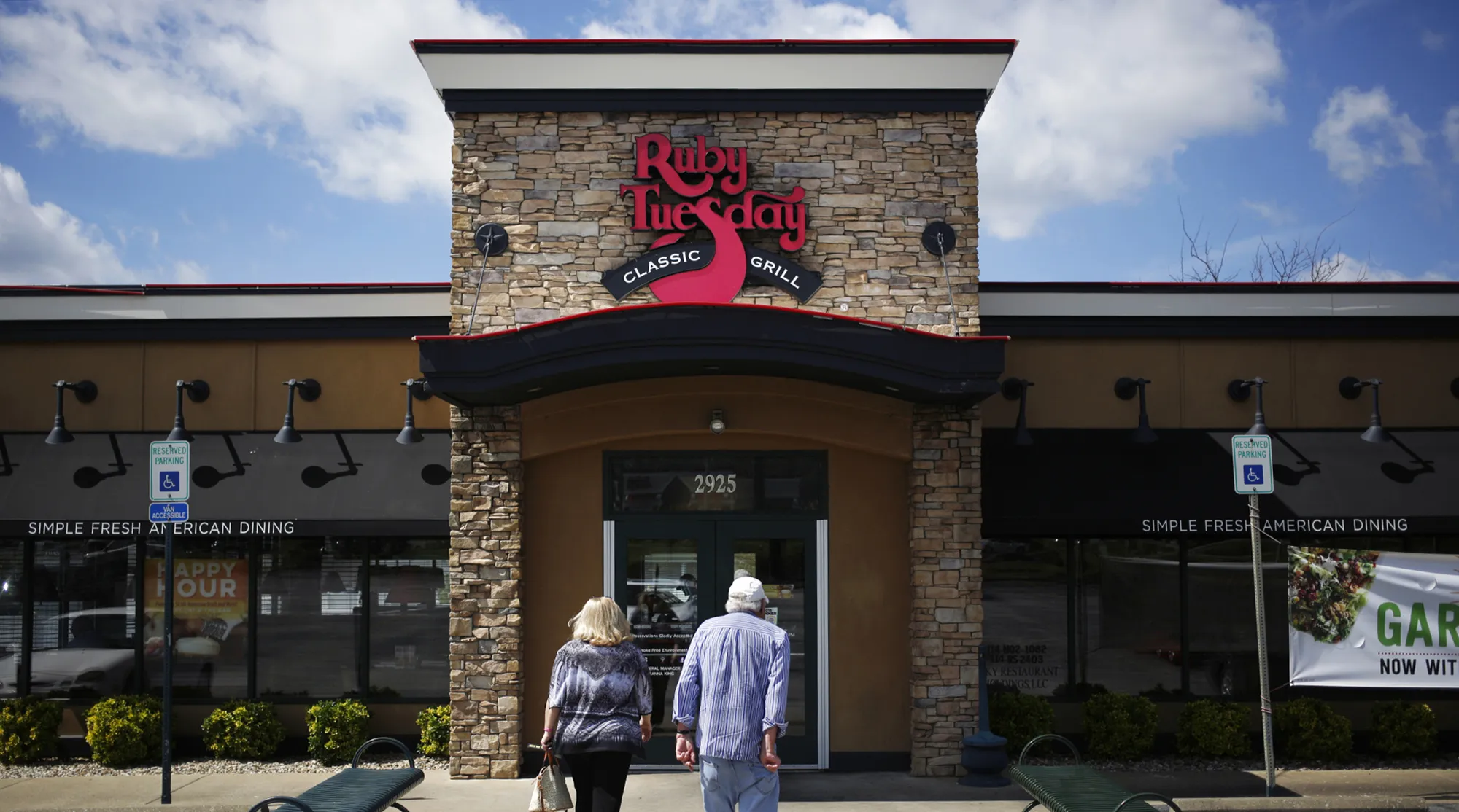 Customers walk towards the entrance of a Ruby Tuesday restaurant in Bowling Green, Kentucky.