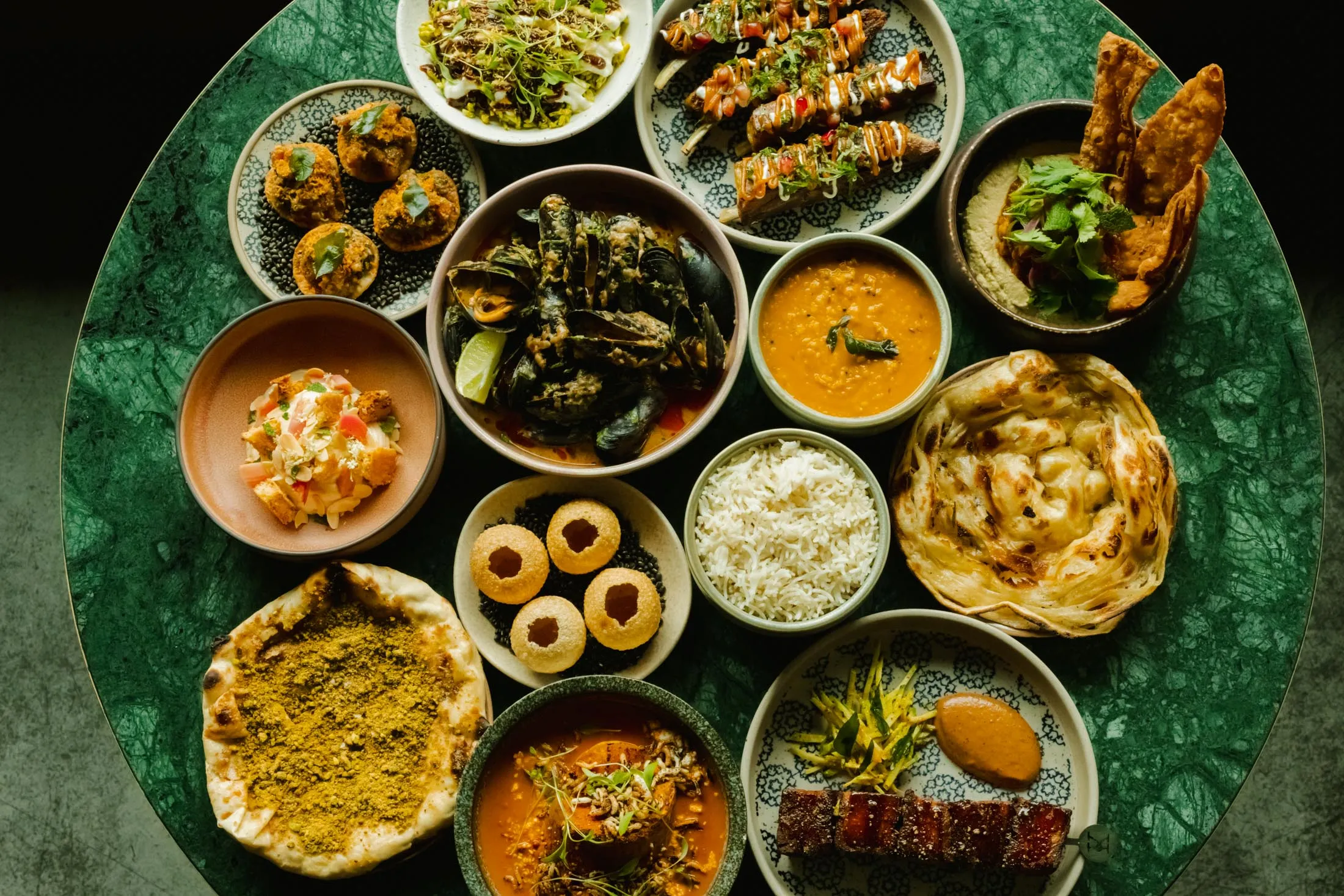 A spread at the modern Indian restaurant Kricket, part of Canary Wharf’s burgeoning dining scene.