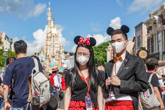 Hong Kong Disneyland Reopens to Masked Guests in Scorching Heat