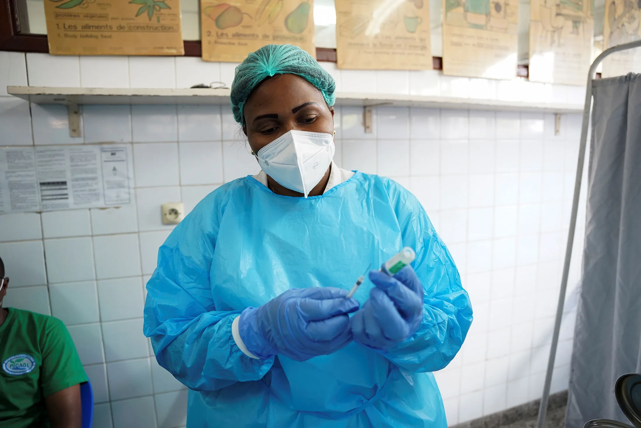 A nurse prepares a dose of the AstraZeneca Covid-19 vaccine at the Ngaliema Clinic in Kinshasa, Democratic Republic of Congo.