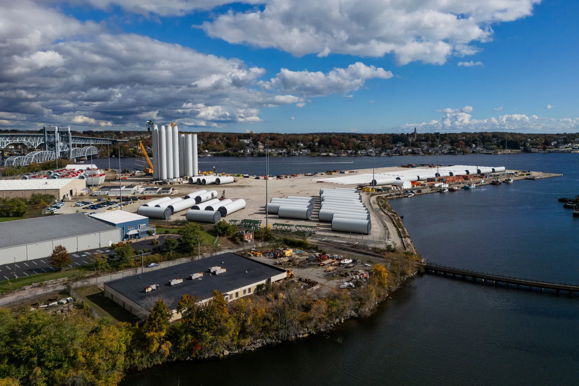 Wind turbine sections and blades at the Revolution Wind project assembly in New London, Connecticut, US.