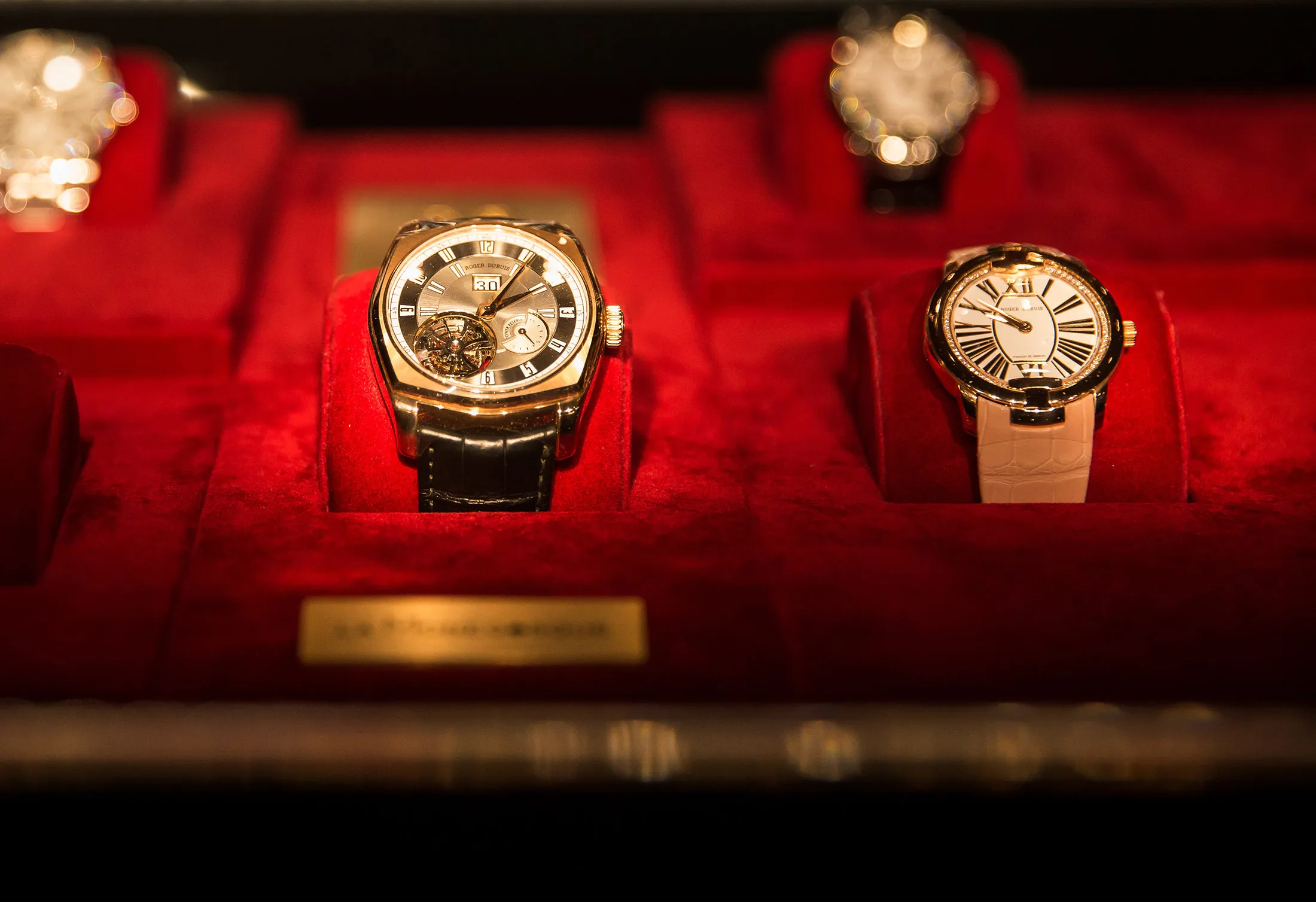 Swiss watches sit on display inside a Unique Timepieces store, in Hong Kong.
