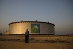 Crude oil storage tanks at the Juaymah tank farm at Saudi Aramco's Ras Tanura oil refinery and oil terminal in Ras Tanura, Saudi Arabia.