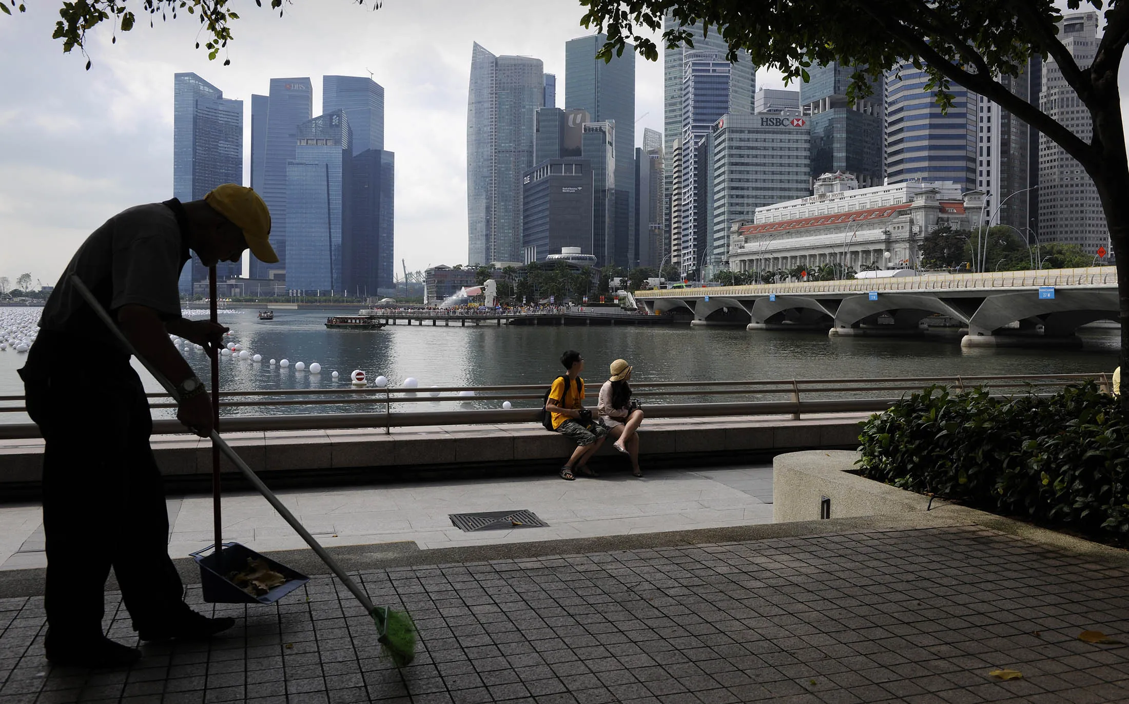 A road sweeper at work on the waterfront, in Singapore.
