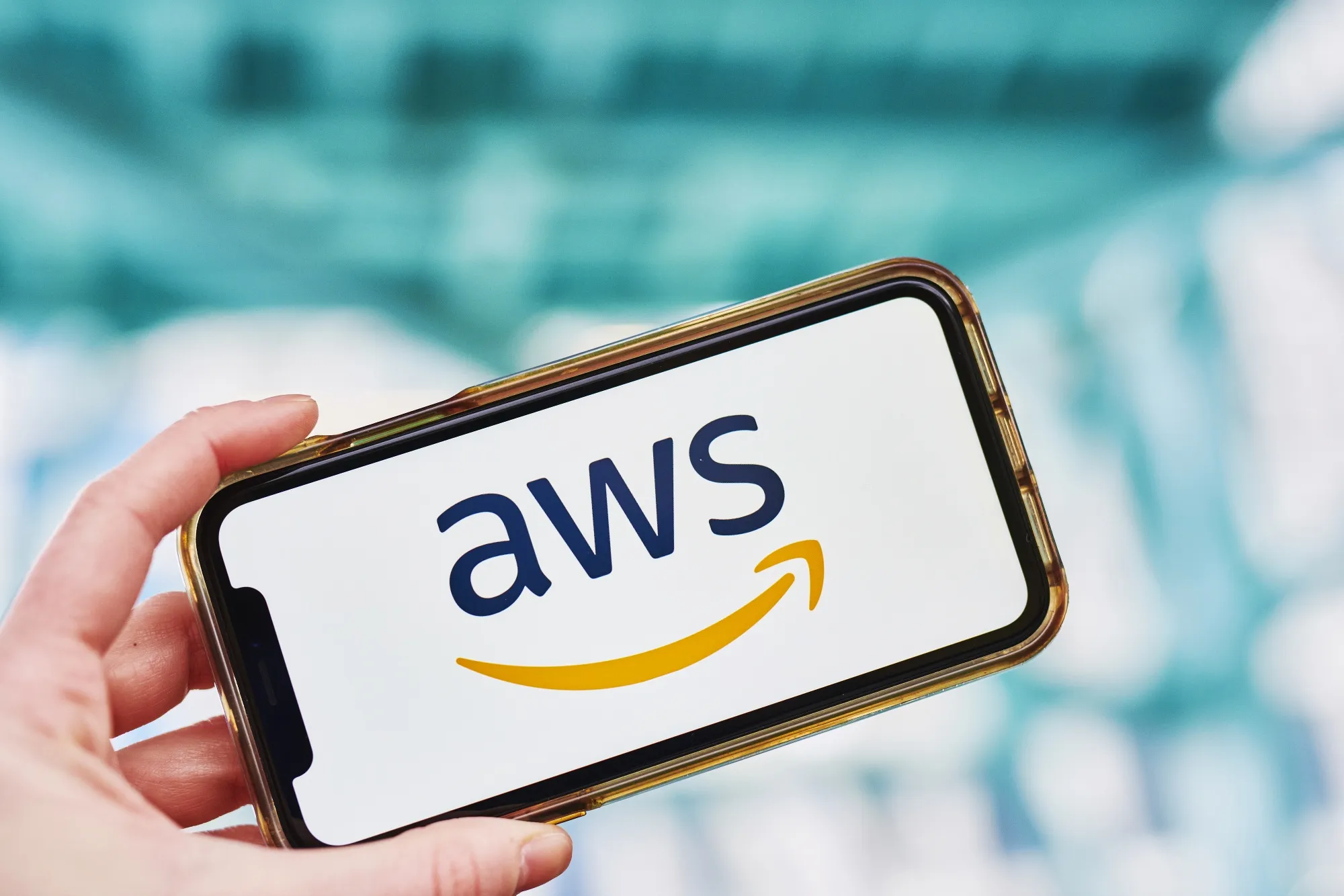 The logo for Amazon Web Services Inc., a subsidiary of Amazon.com Inc., is displayed on an Apple Inc. iPhone in an arranged photograph taken in the Brooklyn Borough of New York, U.S., on Monday, Jan. 27, 2020. Amazon.com Inc. is scheduled to release earnings figures on January 30.