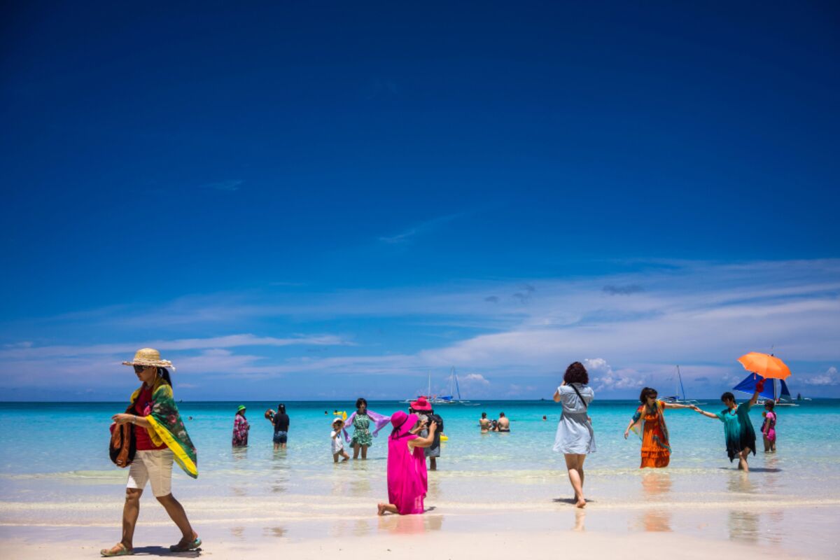 Chinese Tourist on the Beach