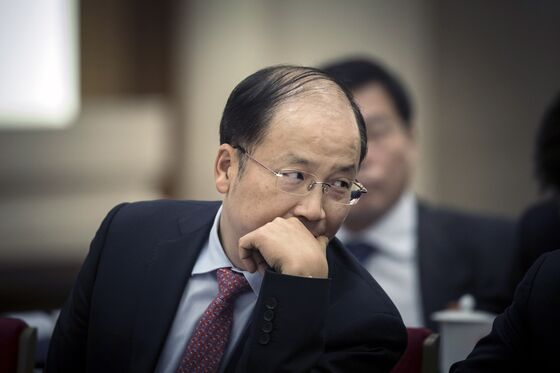 China Names ICBC's Yi as Head of Securities Regulator