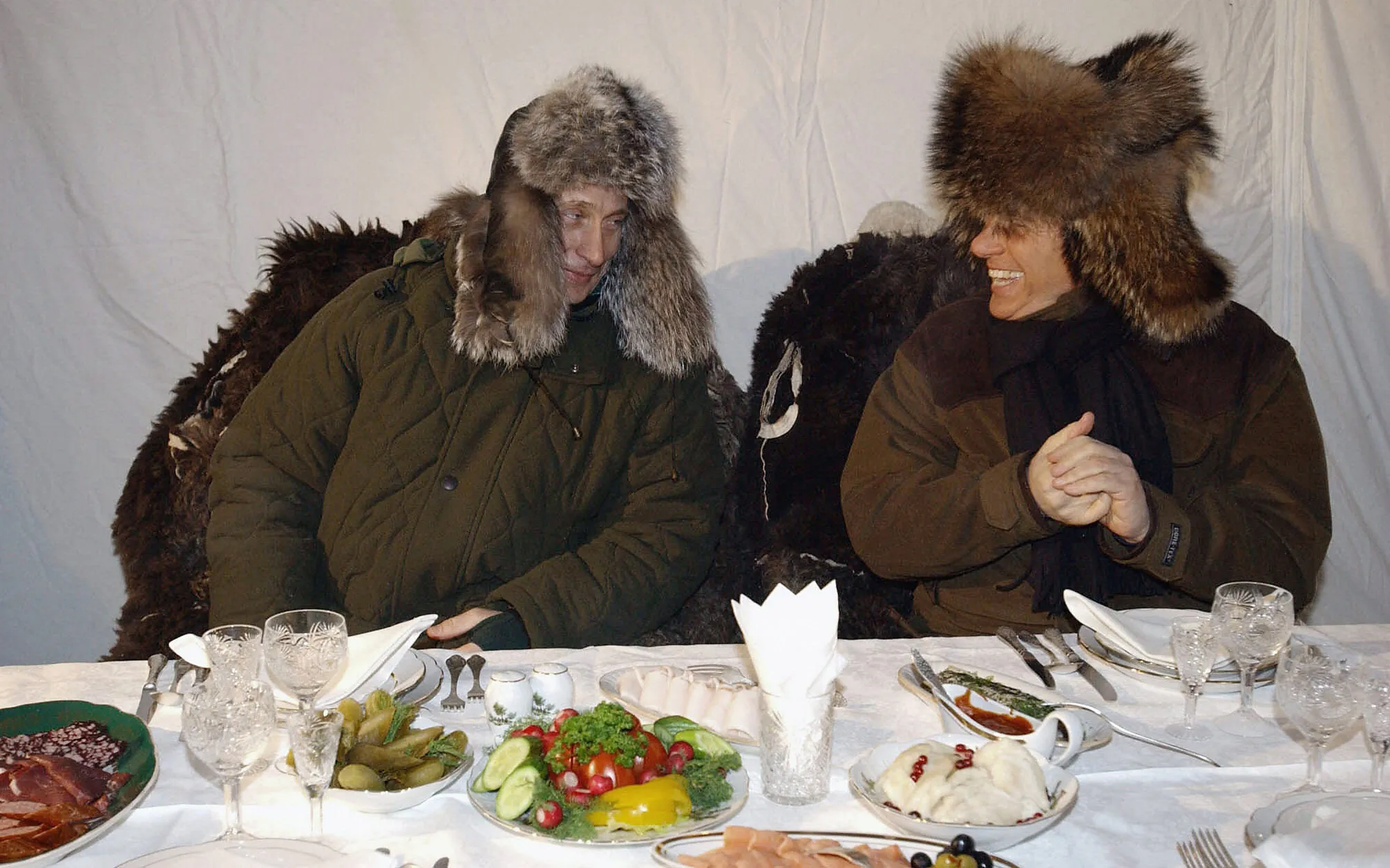 Putin and Berlusconi at a Russian wildlife reserve in February 2003.