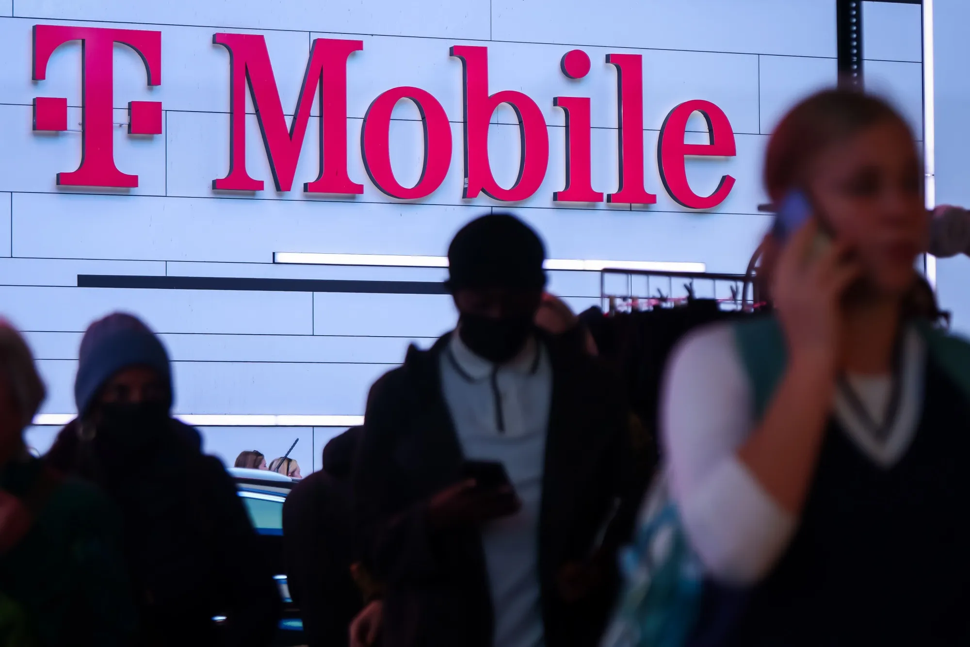 Signage at a T-Mobile store in New York, US, on Wednesday, Oct. 22, 2025. T-Mobile US Inc. is scheduled to release earnings figures on October 23.