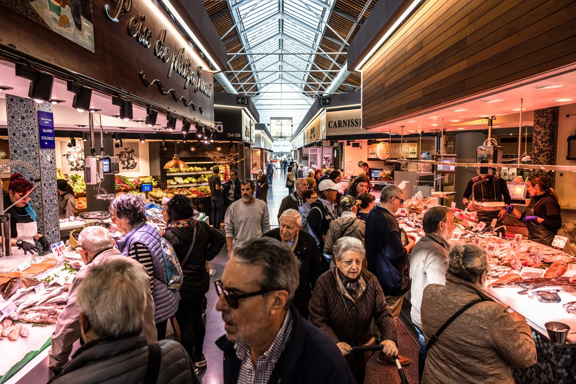 Shoppers inside Sant Antoni market in Barcelona, Spain.
