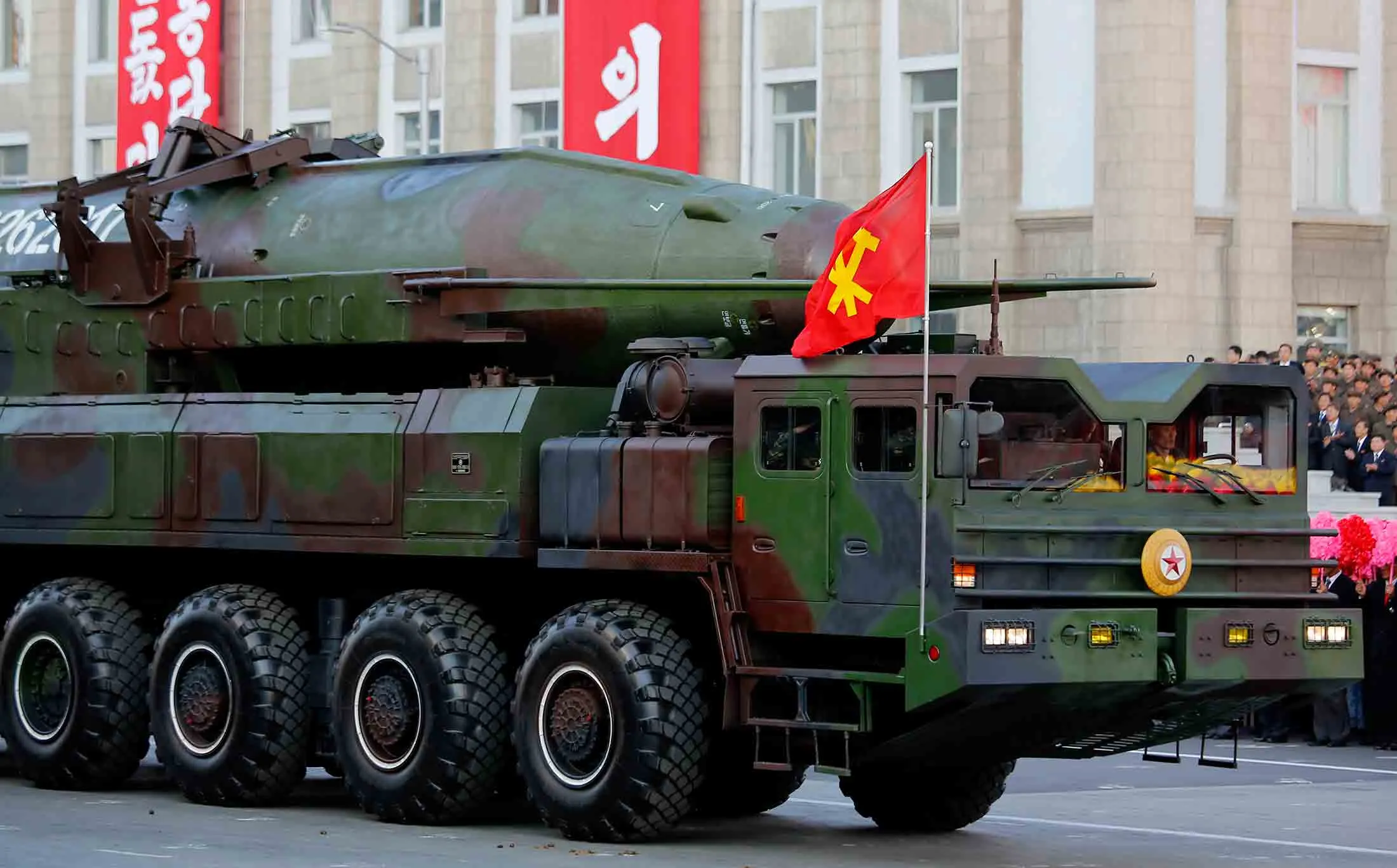 Large missiles, believed to be KN-08 intercontinental ballistic missiles, are paraded in Pyongyang, North Korea during the 70th anniversary celebrations of its ruling party's creation, on Oct. 10, 2015.
