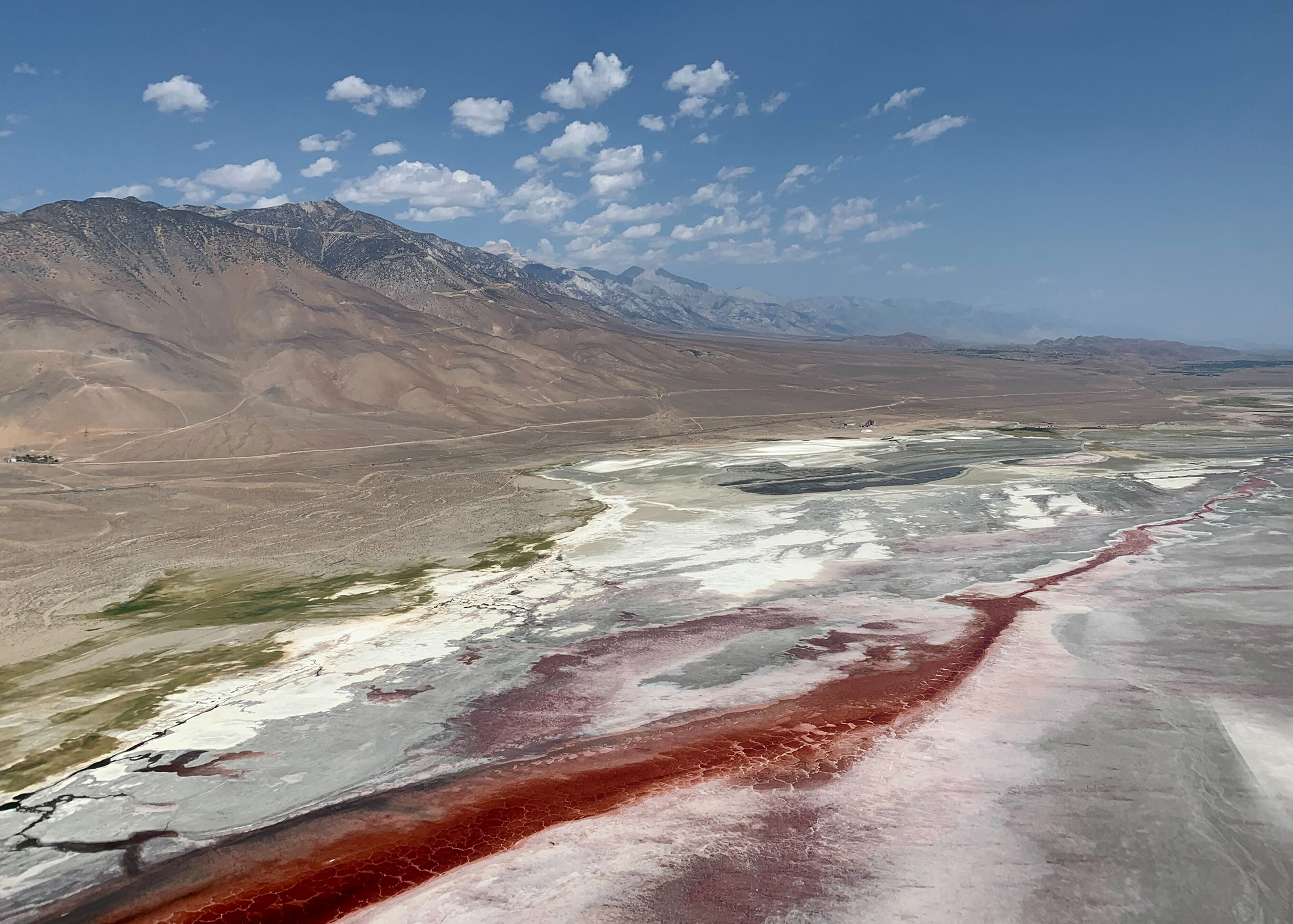 In Owens Valley, about 250 miles north of L.A. and east of the Sierra Nevada, a blood-red gash—actually red algae—stains the brine pool of Owens Lake.