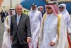 Qatari officials greet Tillerson as he arrives in Doha on July 11.&nbsp;
